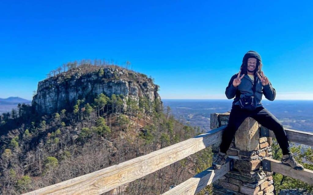 @the_ethnic_explorer Man at Pilot Mountain State Park enjoying the mountain scenery