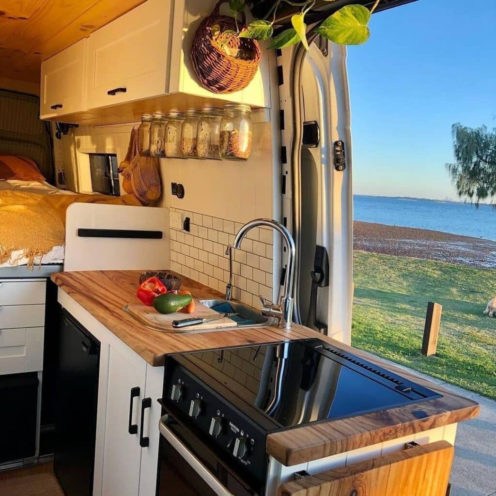 @vanlife_eats Spacious modern camper van kitchen