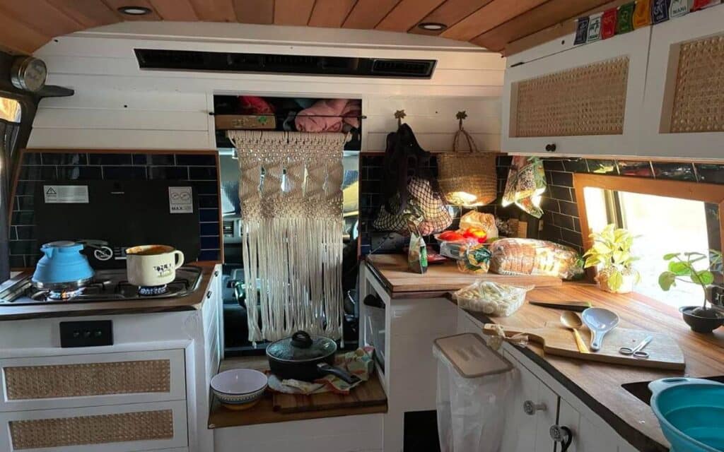 @vanlifecook.aus L-shaped kitchen inside a van