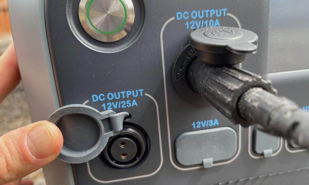 Close up of the DC outputs on the Bluetti AC200P highlighting the 25A aviation plug