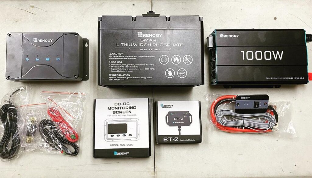 components of the best rv solar panel kit laid out ready to install