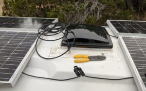 two solar panels mounted on a van roof to demonstrate a solar panels series vs parallel wiring explanation